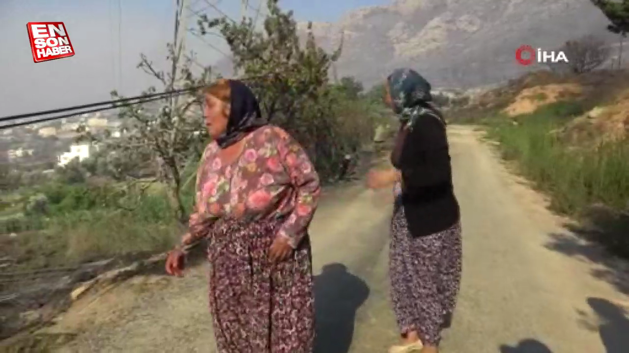 Antalya'da yanmış evlerini görünce gözyaşlarına boğuldular Antalya'da yanmış evlerini görünce gözyaşlarına boğuldular