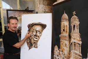 Mardinli ressam zifte yaptığı fotoğrafları Berlin'de sergileyecek