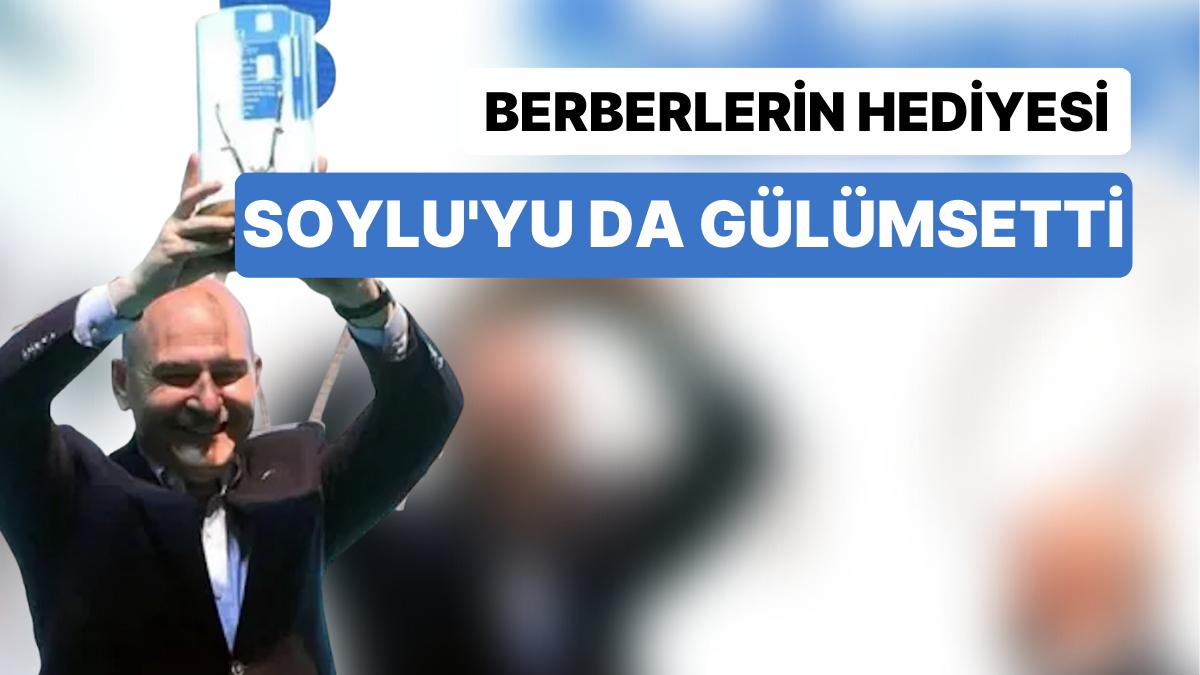 Berberlerden Soylu'ya Cam Fanus İçinde Saç Kesme Makinesi Berberlerden Soylu'ya Cam Fanus İçinde Saç Kesme Makinesi